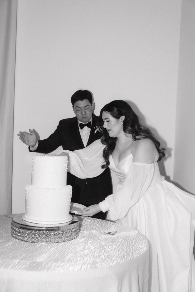 cutting the cake at wedding reception