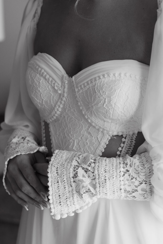 close up of wedding dress black and white photography