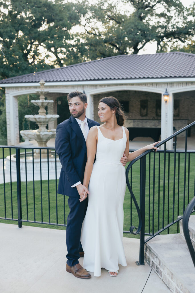 Wedding photography on film of the married couple looking off into the distance.