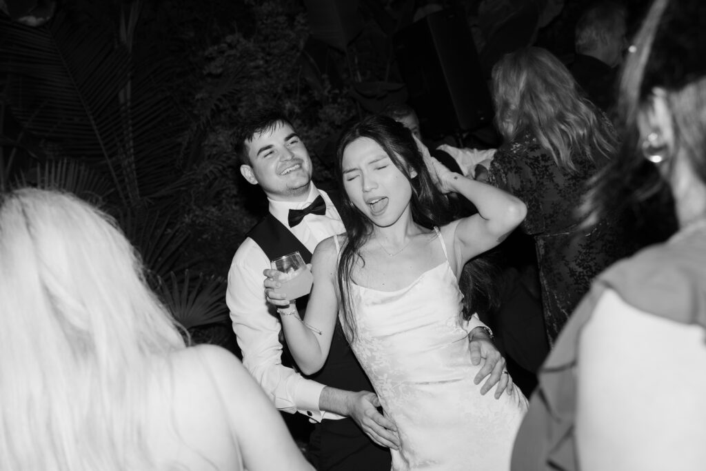 Bride and groom on the dance floor at Honey Locust Farms in Rockwall, Texas.