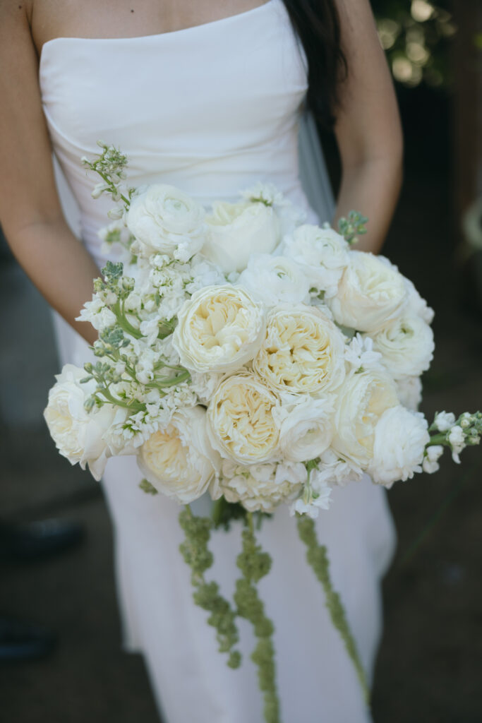 Bridal bouquet of white roses.