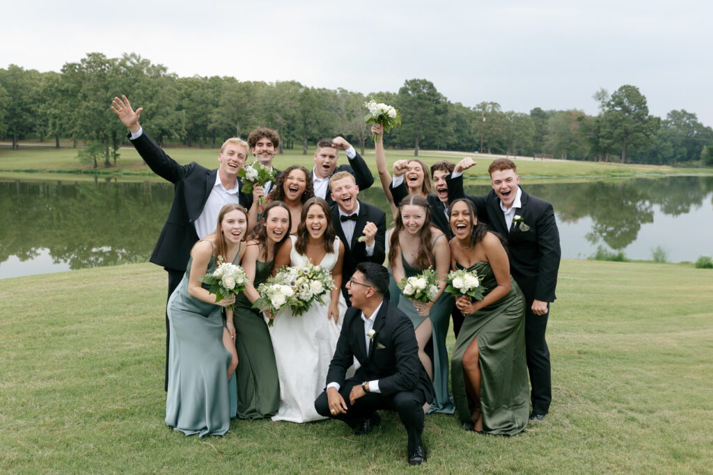 green and white color palette wedding party cheering for bride and groom in a Dallas Wedding